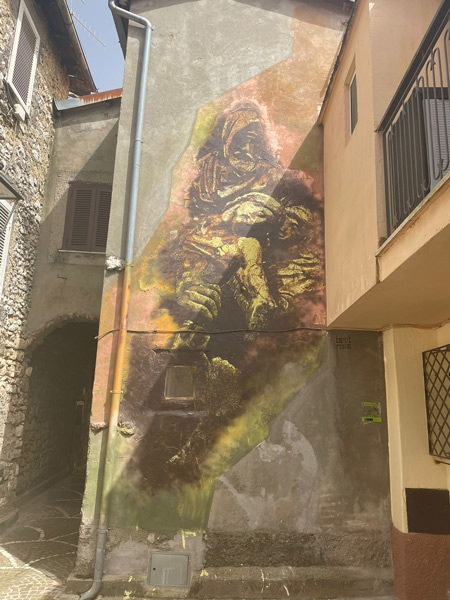 Michelangelo-pietra-murales-fiuggi-terme-fiuggi-fonte-fiuggi-città-cosa-fare-a-fiuggi-cosa-vedere-graffiti-murales-a-fiuggi-città-borgo-antico-centro-storico-storia-di-fiuggi-michelangelo-e-il-mal-di-pietra-arte-art